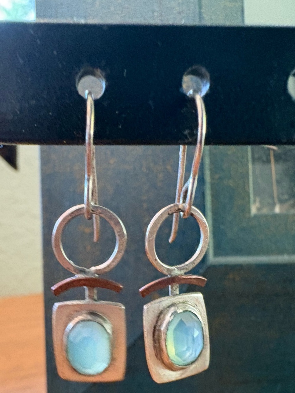 Collection of art fair earrings.